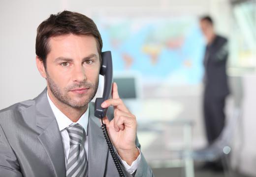 businessman talks on the phone