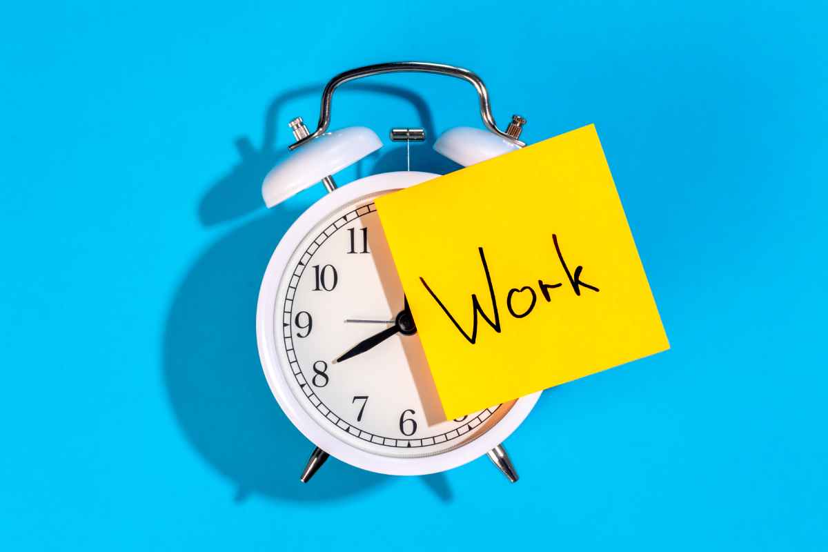 white alarm clock sticker with inscription work blue background 1 1